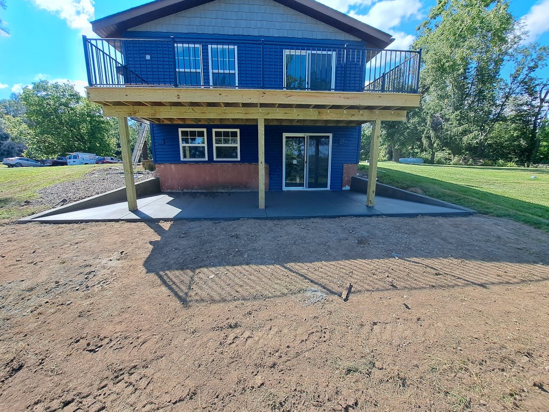 picture of a concrete backyard deck and foundation