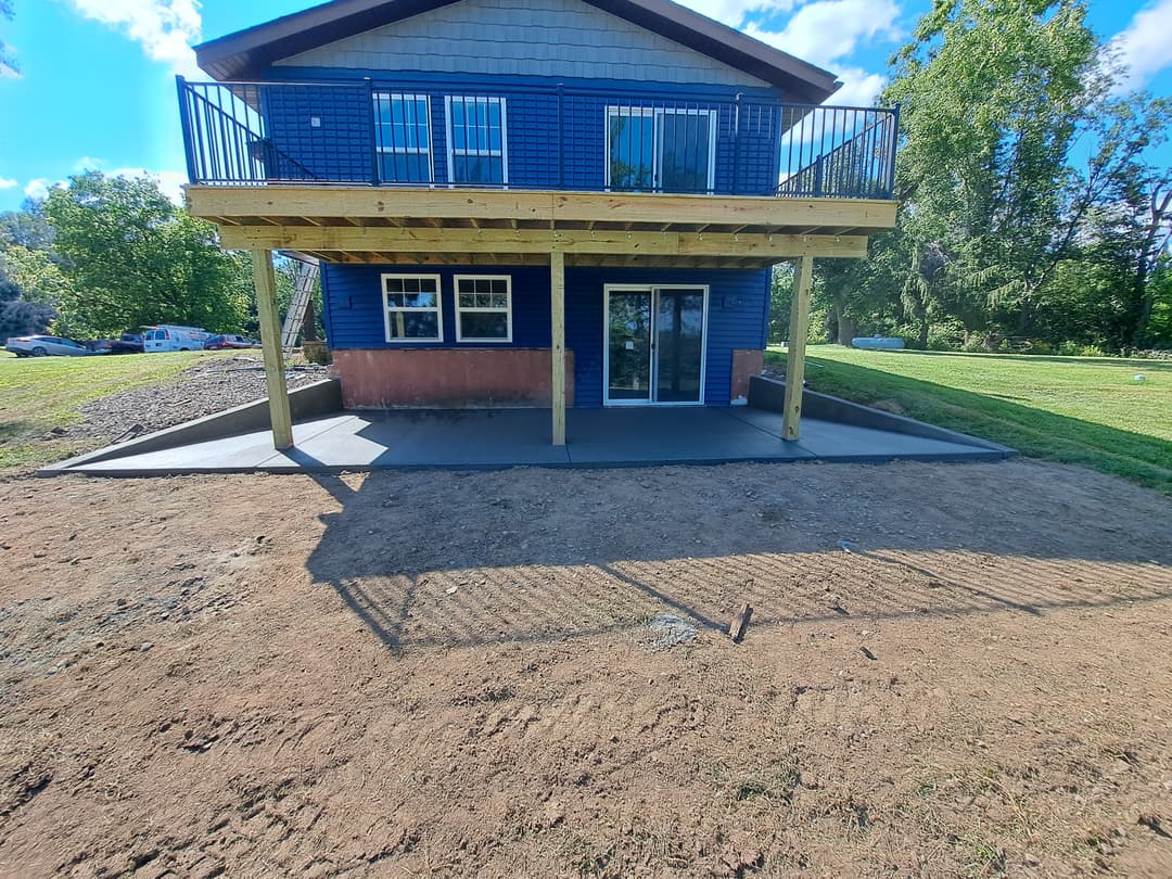 picture of a concrete backyard deck and foundation