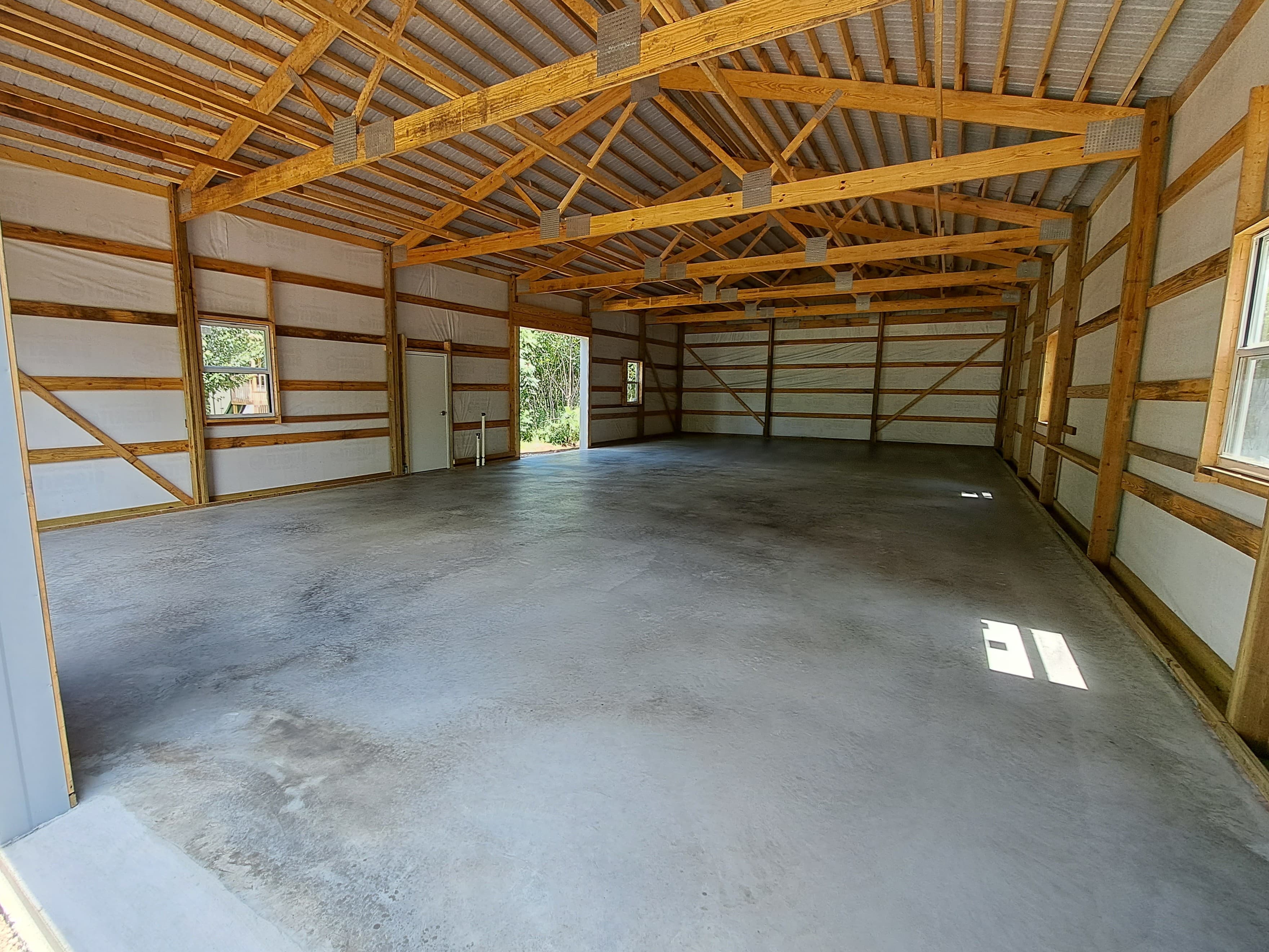picture of a textured beige concrete backyard patio